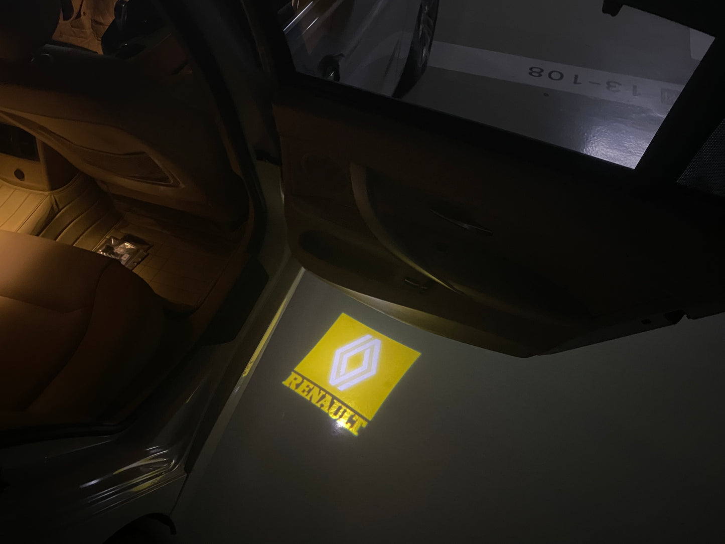 RENAULT ORIGINAL LOGO PROJECROTR LIGHTS Nr.0958 (quantity 1 = 2 Logo Film & 2 door lights)