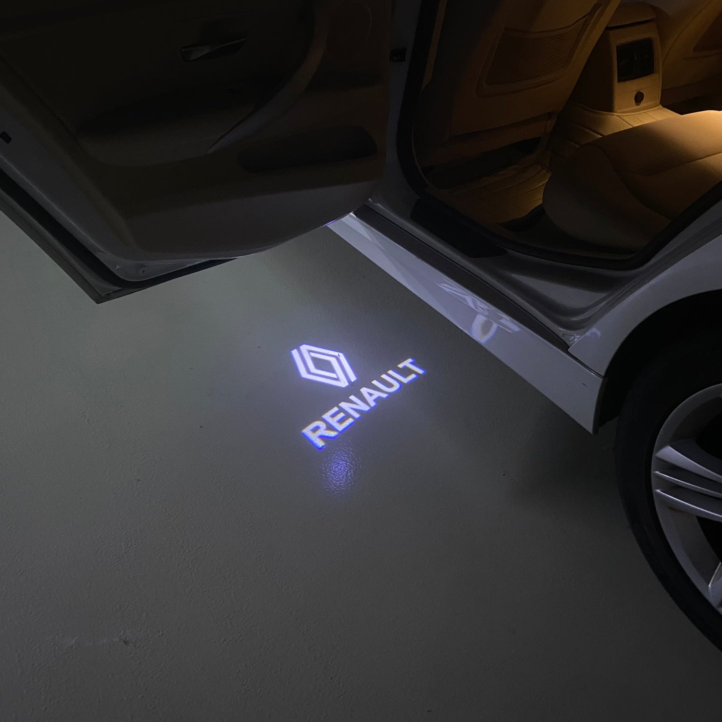 RENAULT ORIGINAL LOGO PROJECROTR LIGHTS Nr.0963 (quantity 1 = 2 Logo Film & 2 door lights)
