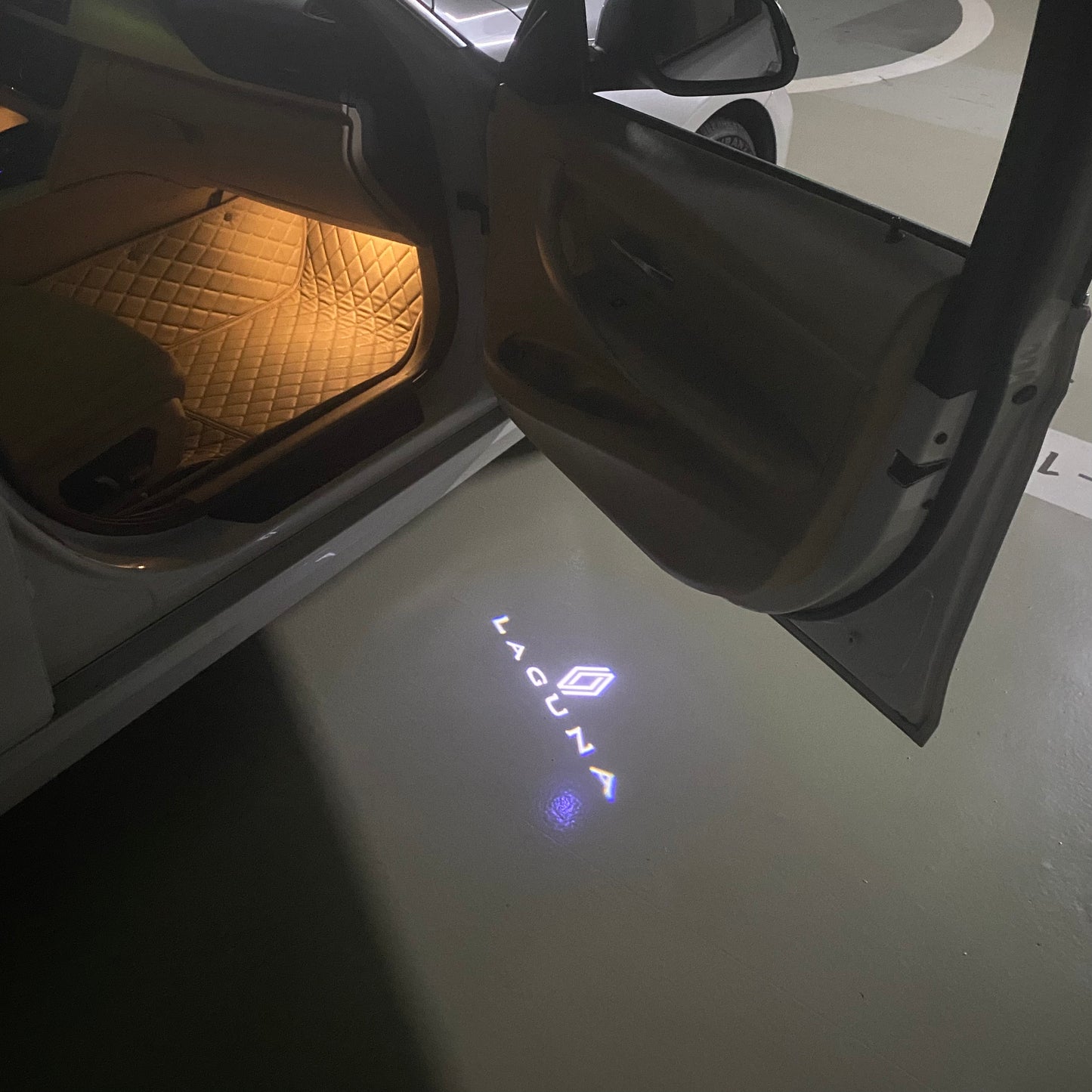 RENAULT Laguna LOGO PROJECROTR LIGHTS Nr.0919 (quantity 1 = 2 Logo Film & 2 door lights)