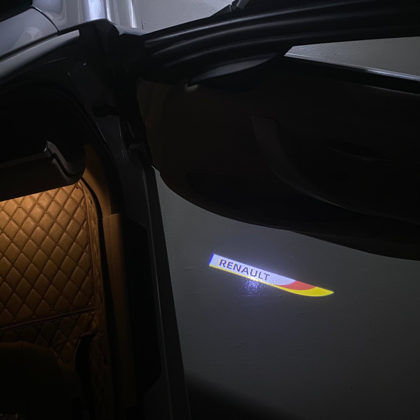 RENAULT ORIGINAL LOGO PROJECROTR LIGHTS Nr.0910 (quantity 1 = 2 Logo Film & 2 door lights)