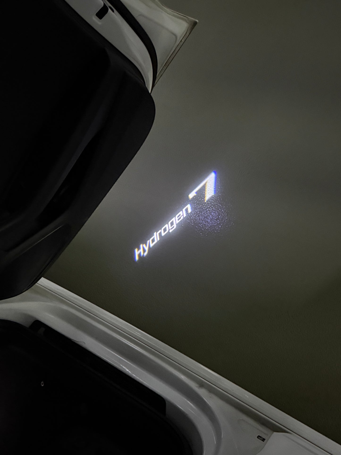 BMW HYDROGEN 7 LOGO PROJECTOT LIGHTS (quantity 1 = 1 sets/2 door lights) Nr.6024q0t077