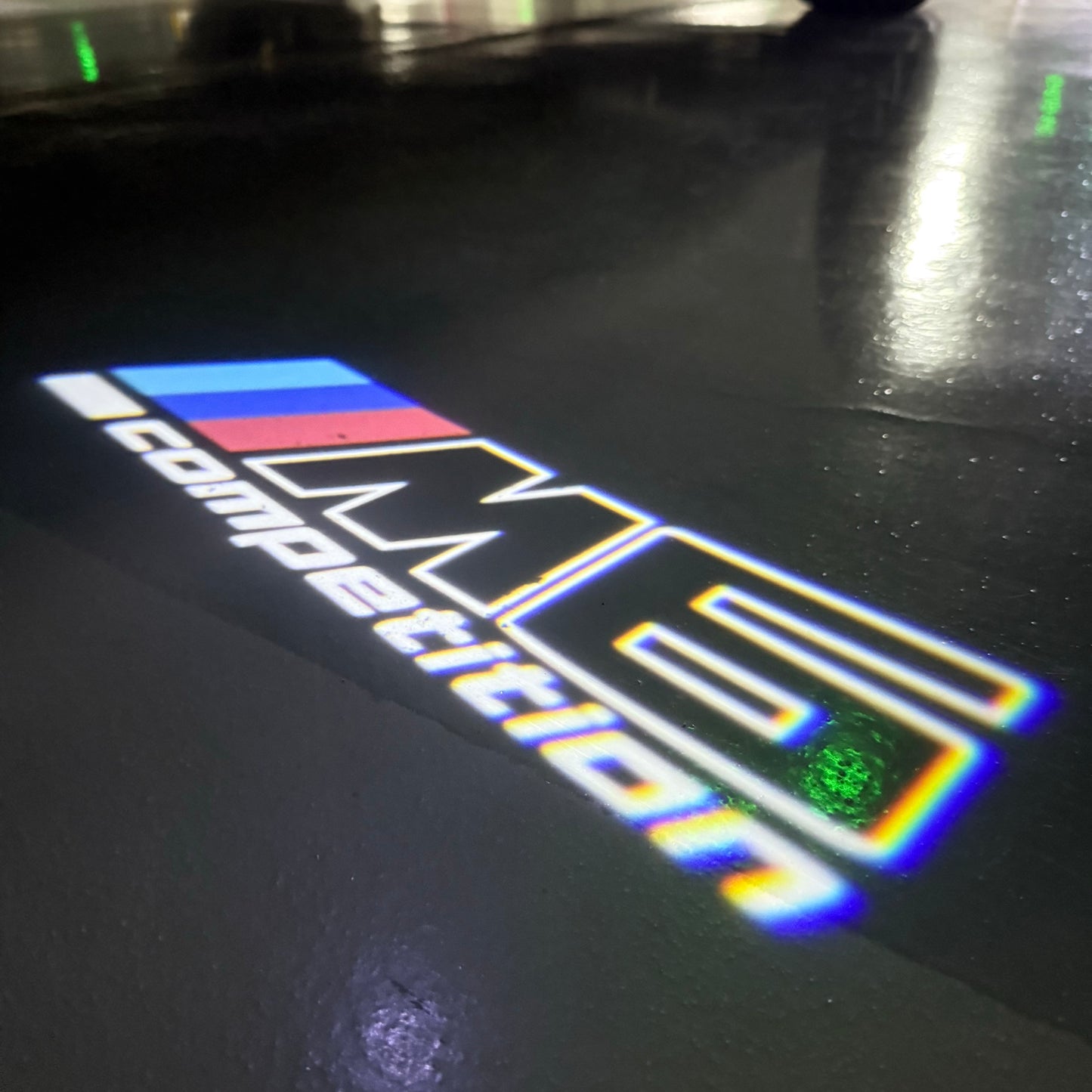 BMW 6 SERIES M6 LOGO PROJECTOT LIGHTS (quantity 1 = 1 sets/2 door lights) Nr.6024q115