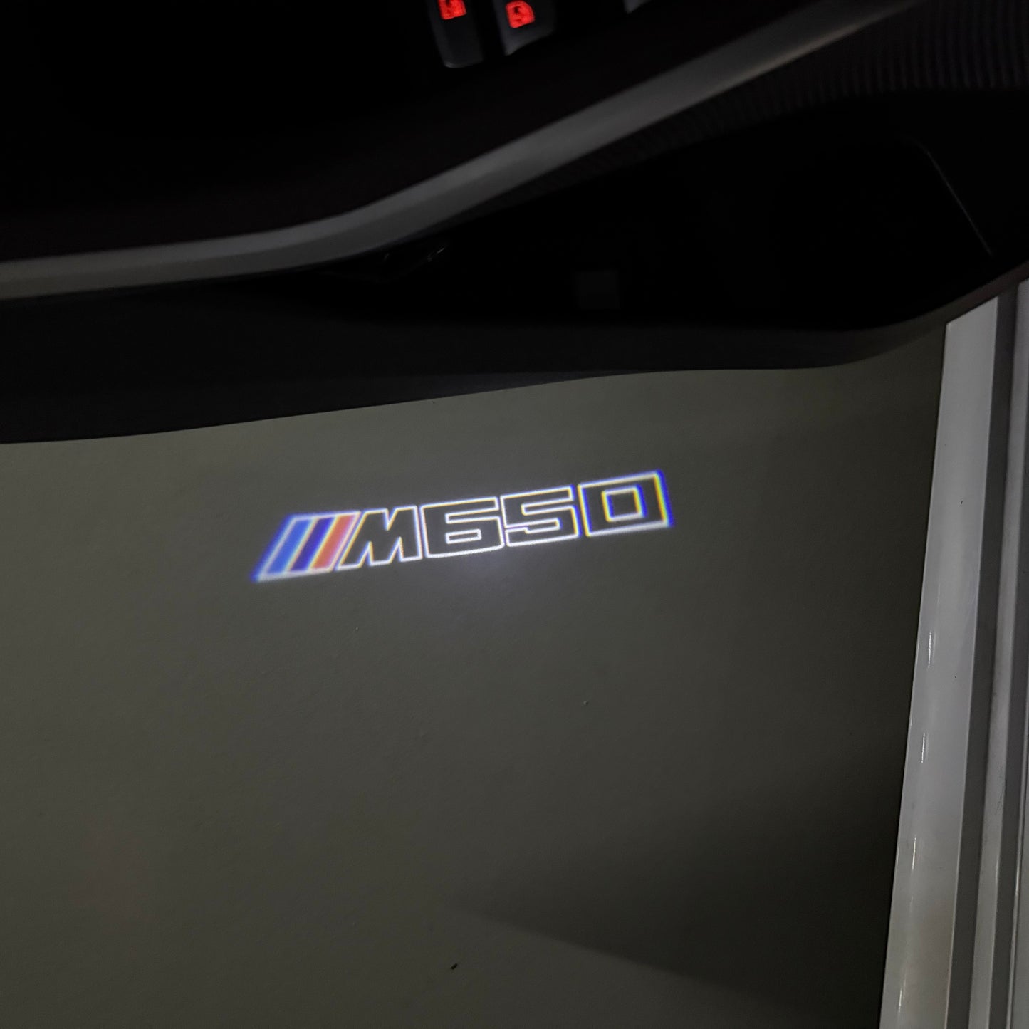 BMW 6 SERIES M650 LOGO PROJECTOT LIGHTS (quantity 1 = 1 sets/2 door lights) Nr.6024S27