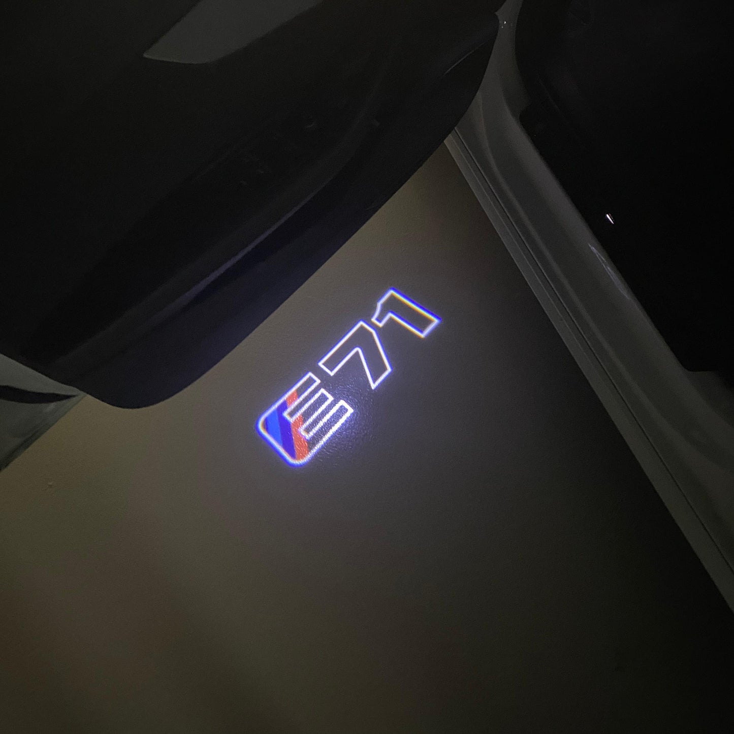 BMW X6 / X6M E71 LOGO PROJECTOT LIGHTS (quantity 1 = 1 sets/2 door lights) Nr.6024q0t0101