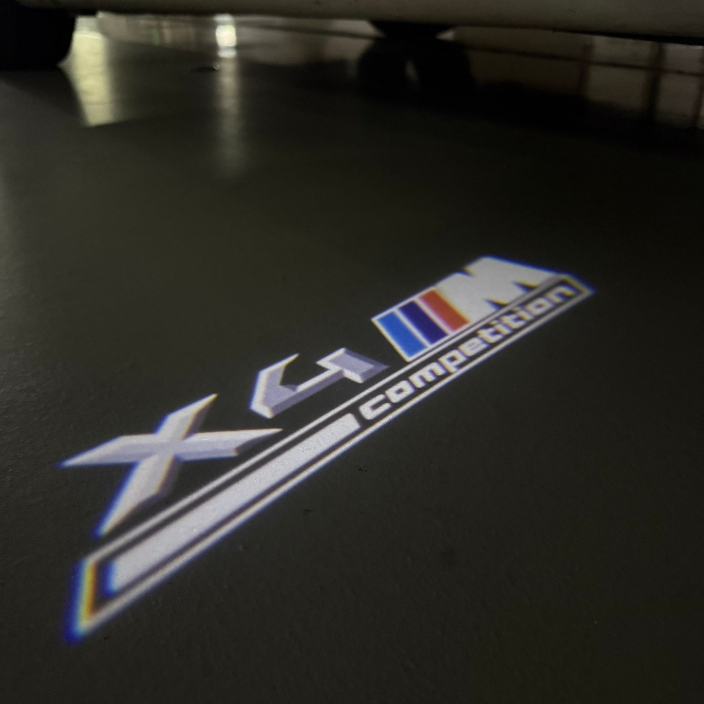 BMW X4M LOGO PROJECTOT LIGHTS (quantity 1 = 1 sets/2 door lights) Nr.6024q0t042
