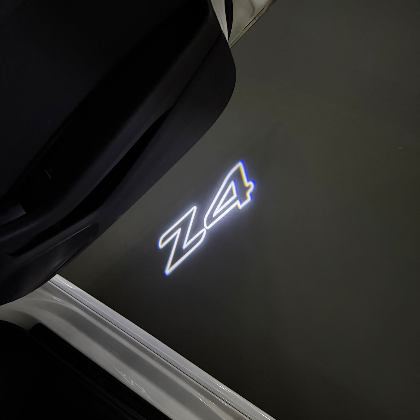 BMW Z4 LOGO PROJECTOT LIGHTS (quantity 1 = 1 sets/2 door lights) Nr.6024q0t0136