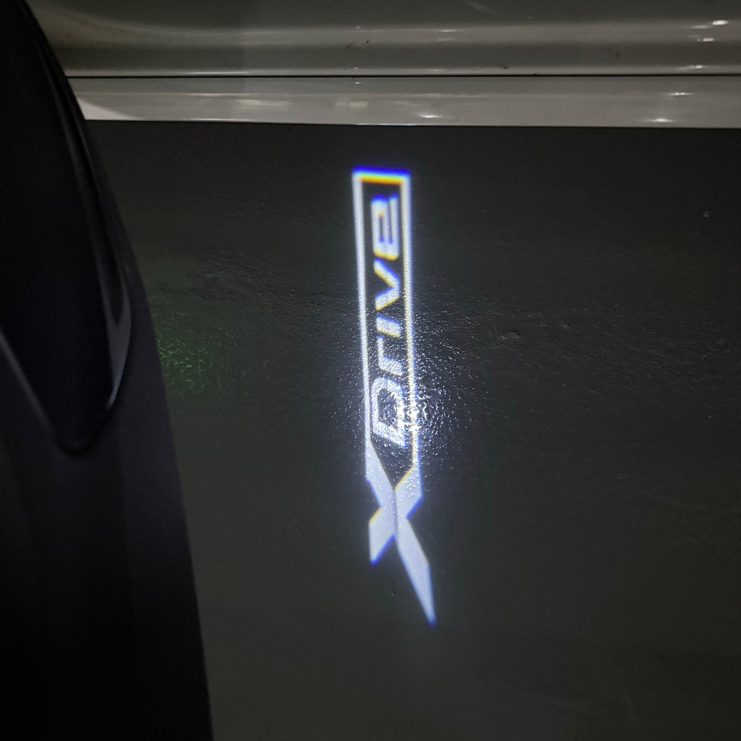 BMW X Drive LOGO PROJECTOT LIGHTS (quantity 1 = 1 sets/2 door lights) Nr.6024q179