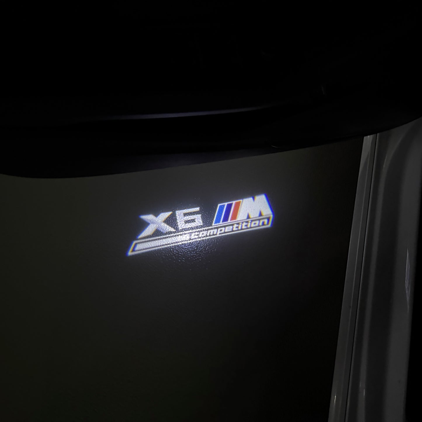 BMW X6M LOGO PROJECTOT LIGHTS (quantity 1 = 1 sets/2 door lights) Nr.6024q0t054