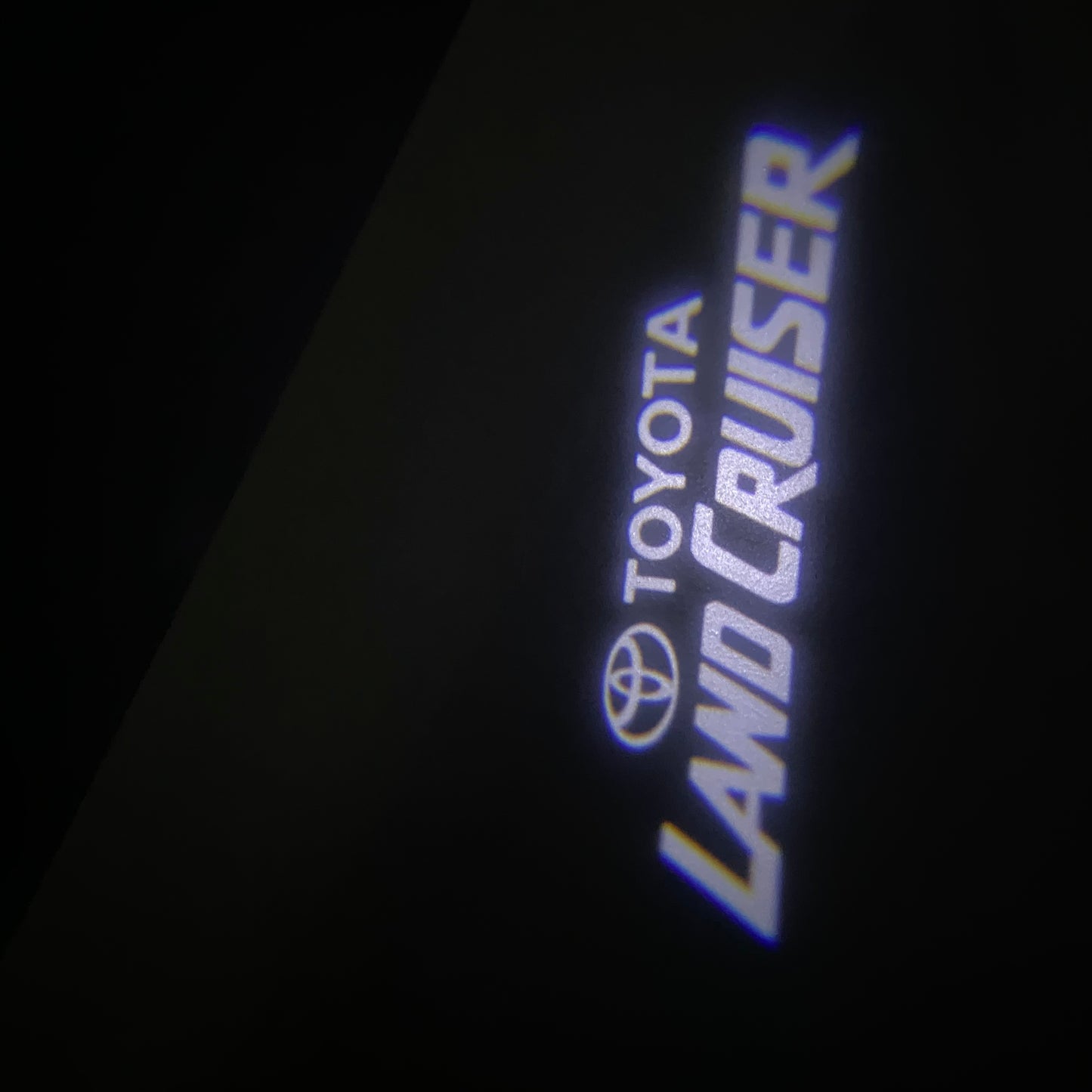 TOYOTA LAND CRUISER LOGO PROJECROTR LIGHTS (quantity 1 = 1 sets/2 door lights) Nr.0GP38