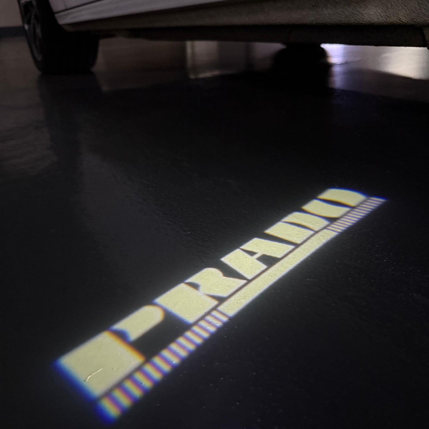 TOYOTA PRADO LOGO PROJECROTR LIGHTS (quantity 1 = 1 sets/2 door lights) Nr.0G15