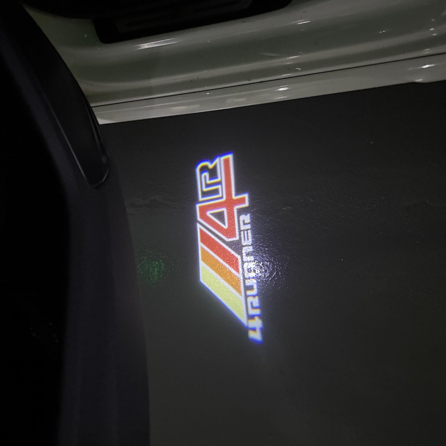 TOYOTA 4RUNNER LOGO PROJECROTR LIGHTS (quantity 1 = 1 sets/2 door lights) Nr.0GP05