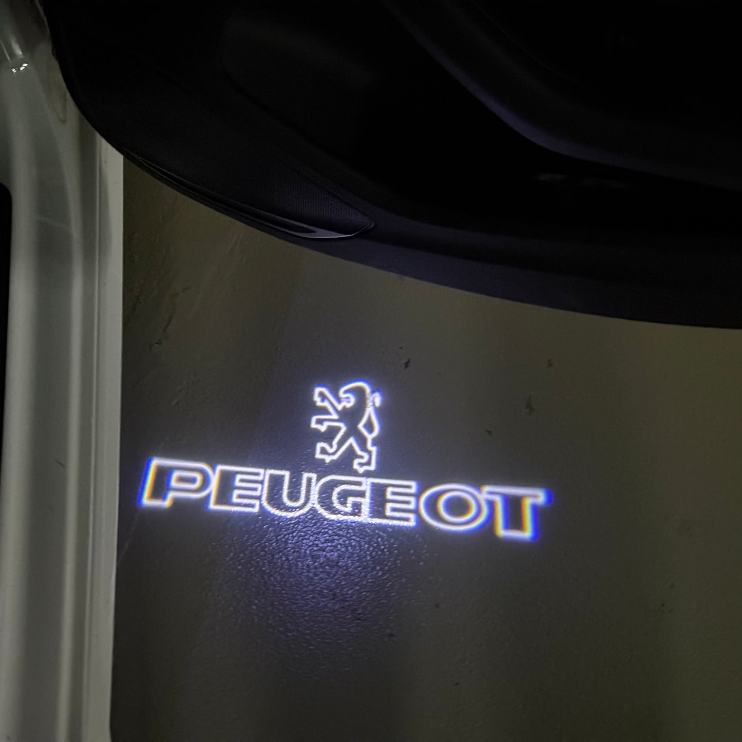 PEUGEOT ORIGINAL LOGO PROJECTOT LIGHTS (quantity 1 = 1 sets/2 door lights) Nr.6024q69