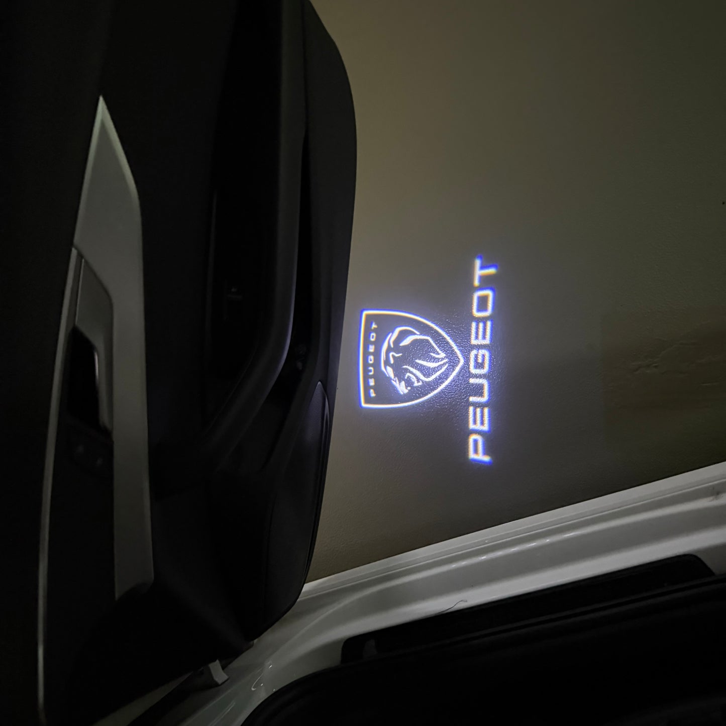 PEUGEOT ORIGINAL LOGO PROJECTOT LIGHTS (quantity 1 = 1 sets/2 door lights) Nr.6024q71