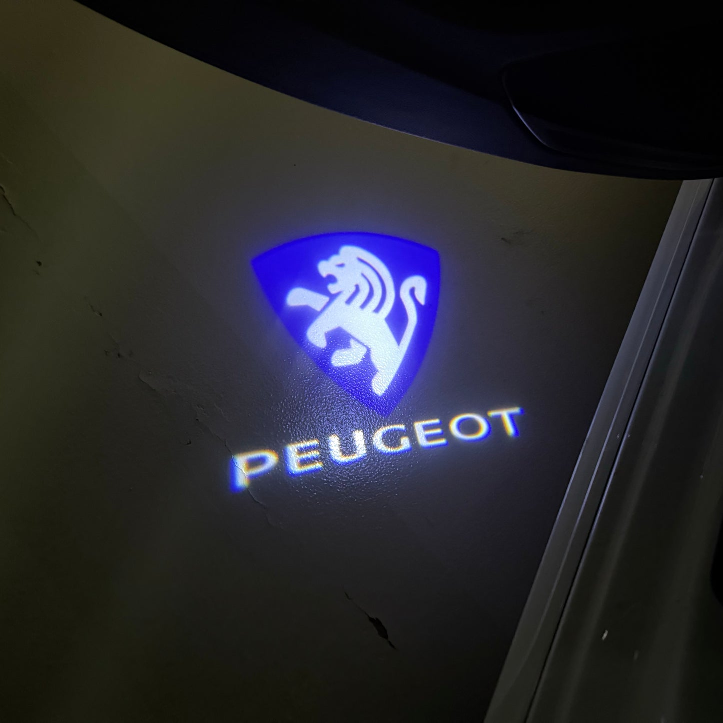 PEUGEOT ORIGINAL LOGO PROJECTOT LIGHTS (quantity 1 = 1 sets/2 door lights) Nr.6024q70