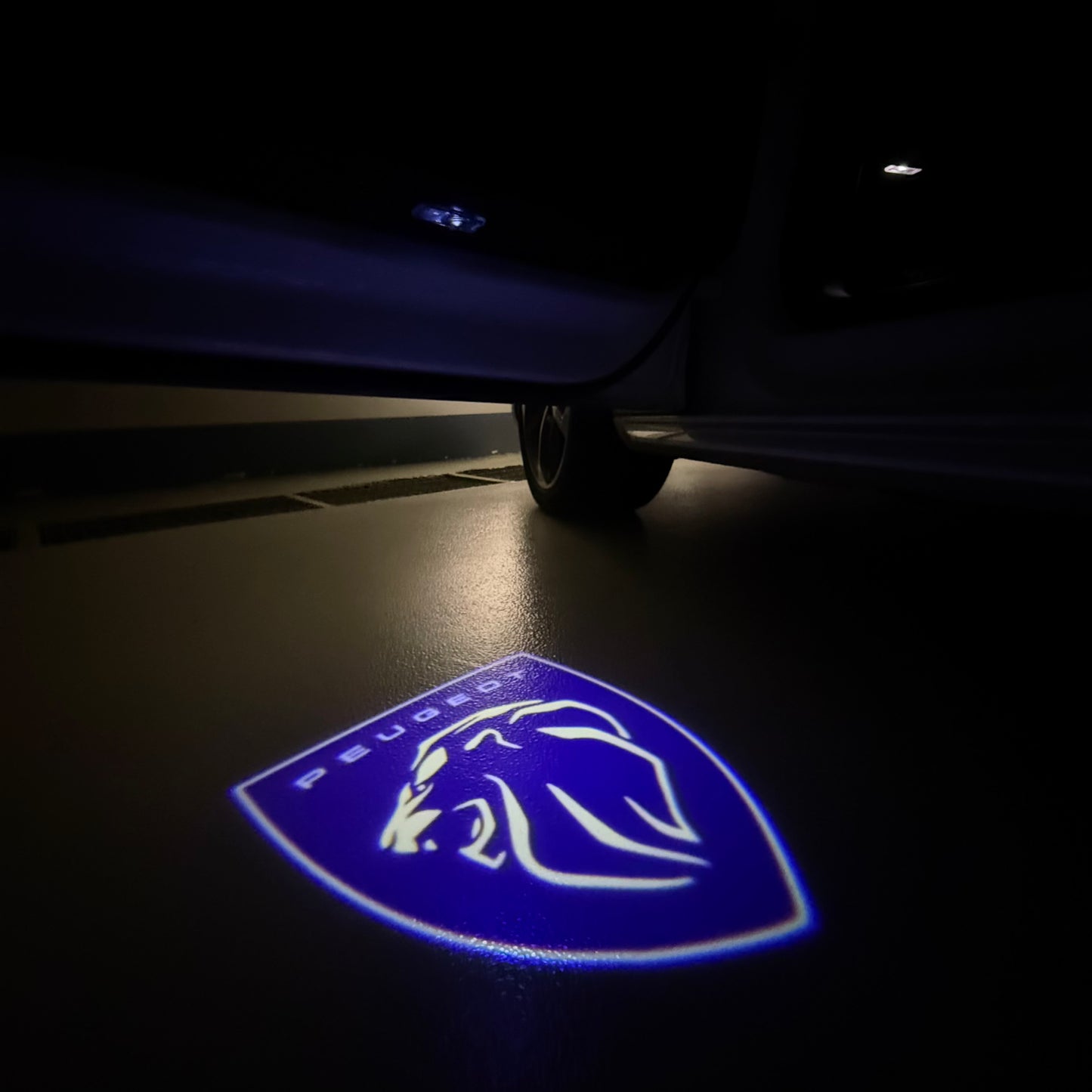 PEUGEOT ORIGINAL LOGO PROJECTOT LIGHTS (quantity 1 = 1 sets/2 door lights) Nr.6024q74