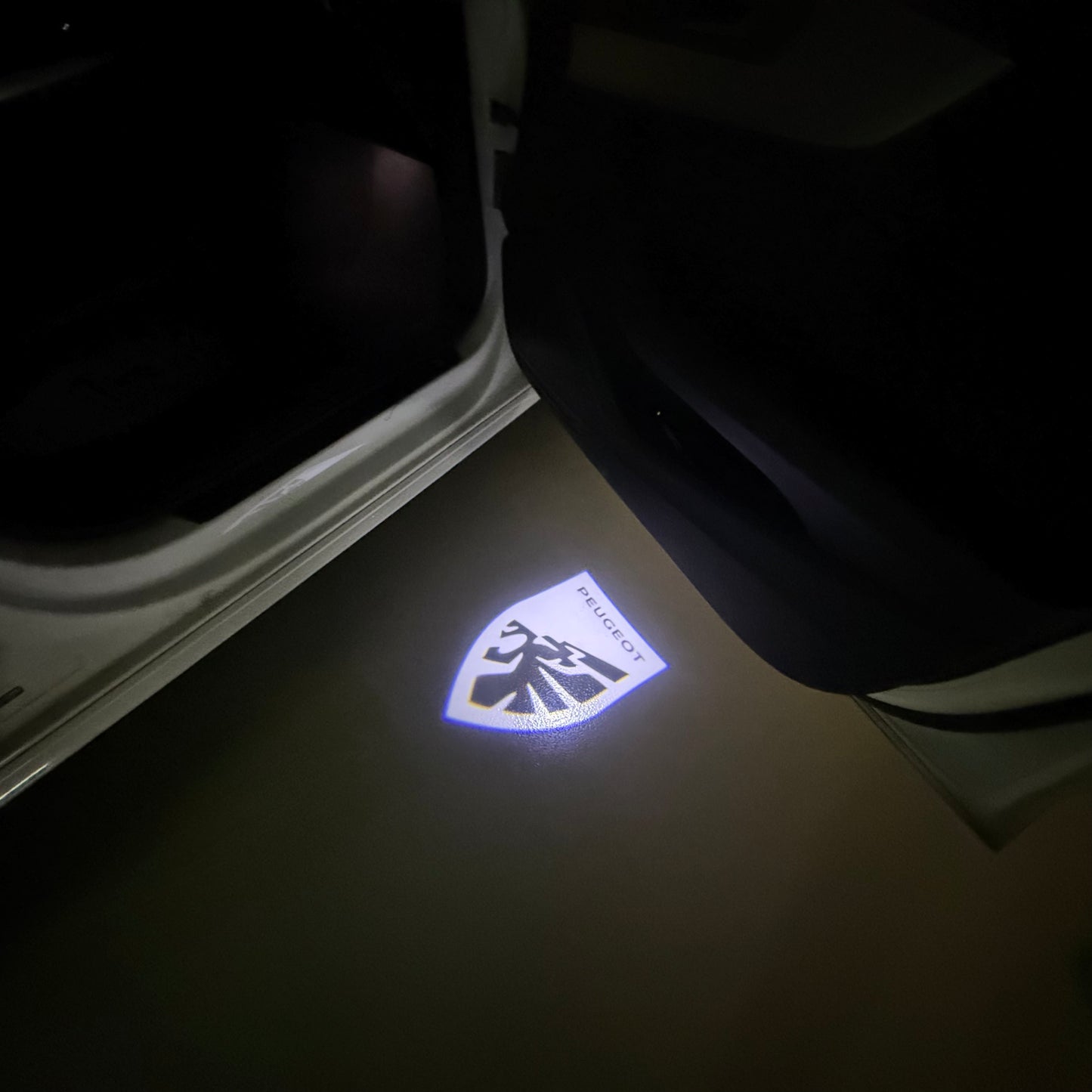 PEUGEOT ORIGINAL LOGO PROJECTOT LIGHTS (quantity 1 = 1 sets/2 door lights) Nr.6024q66