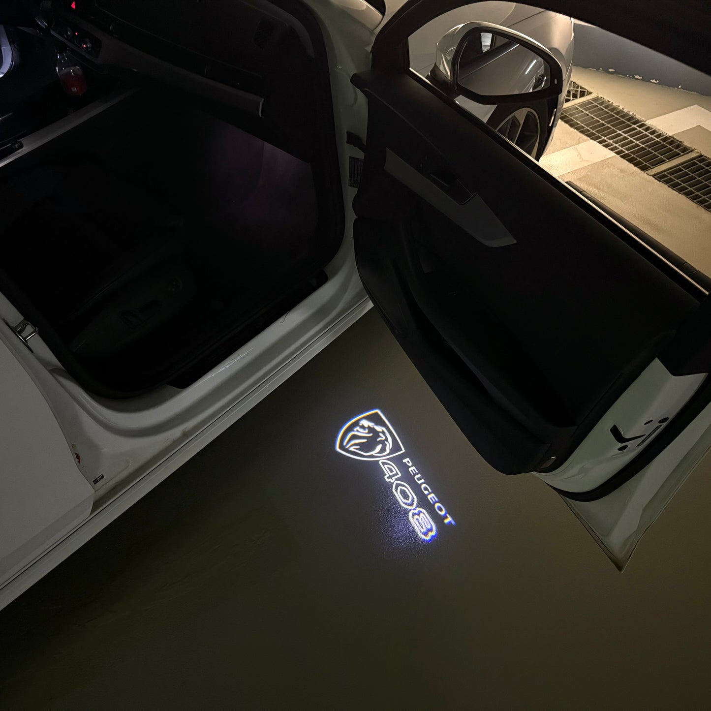 PEUGEOT 408 LOGO PROJECTOT LIGHTS (quantity 1 = 1 sets/2 door lights) Nr.6024q40