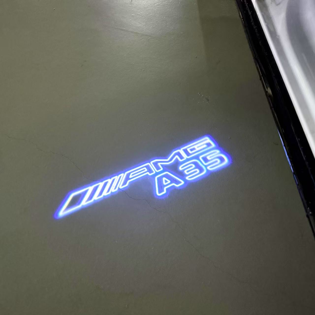 MERCEDES BENZ A35 AMG LOGO PROJECTOR LIGHTS (quantity 1 = 1 sets/2 door lights)Nr.03f021