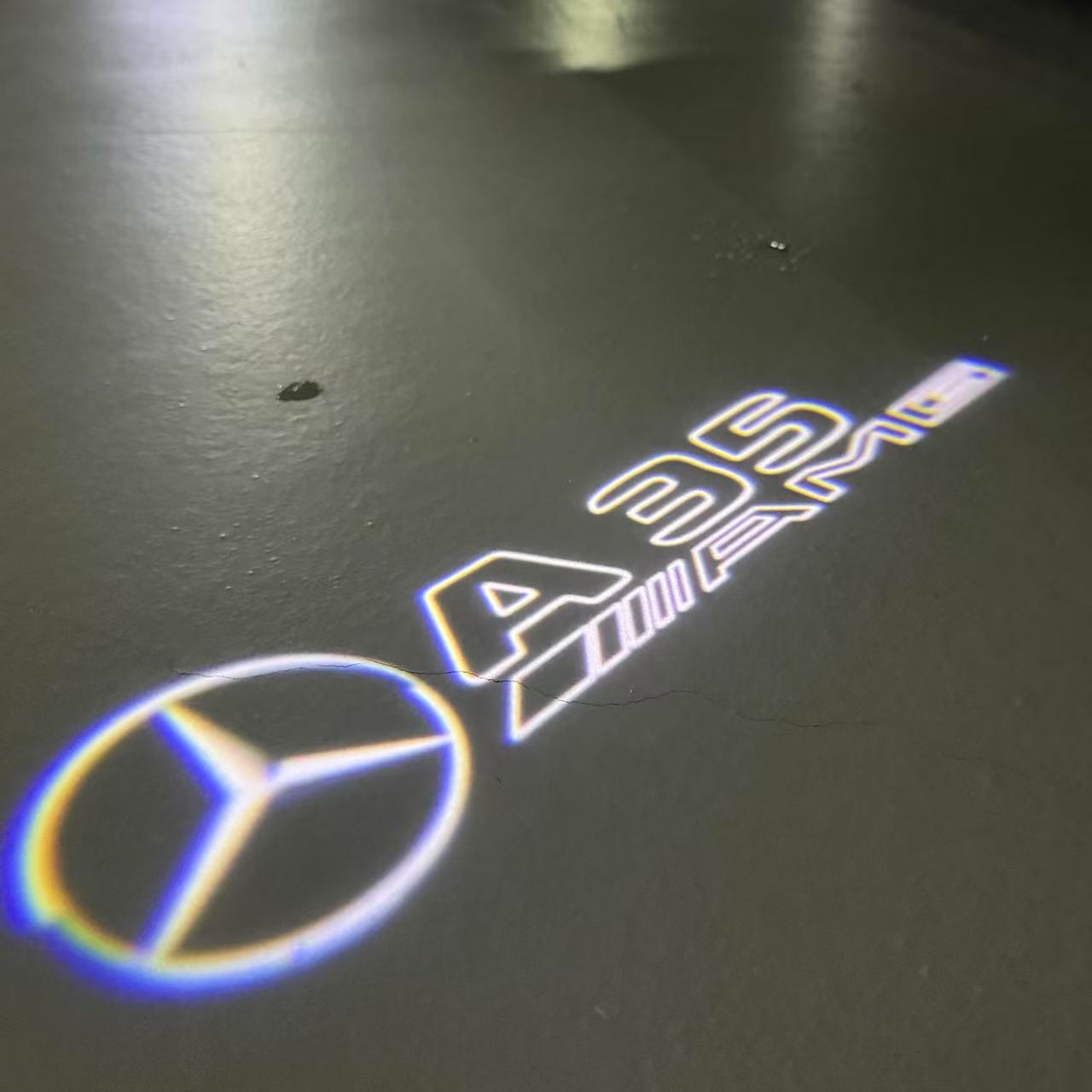 MERCEDES BENZ A35 AMG LOGO PROJECTOR LIGHTS (quantity 1 = 1 sets/2 door lights)Nr.03f022