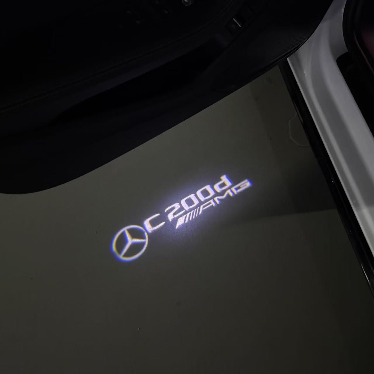 MERCEDES BENZ C 200d AMG LOGO PROJECTOT LIGHTS (quantity 1 = 1 sets/2 door lights)Nr.03f023