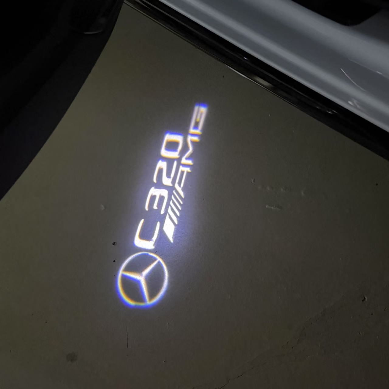 MERCEDES BENZ C 320 AMG LOGO PROJECTOT LIGHTS (quantity 1 = 1 sets/2 door lights)Nr.03f039