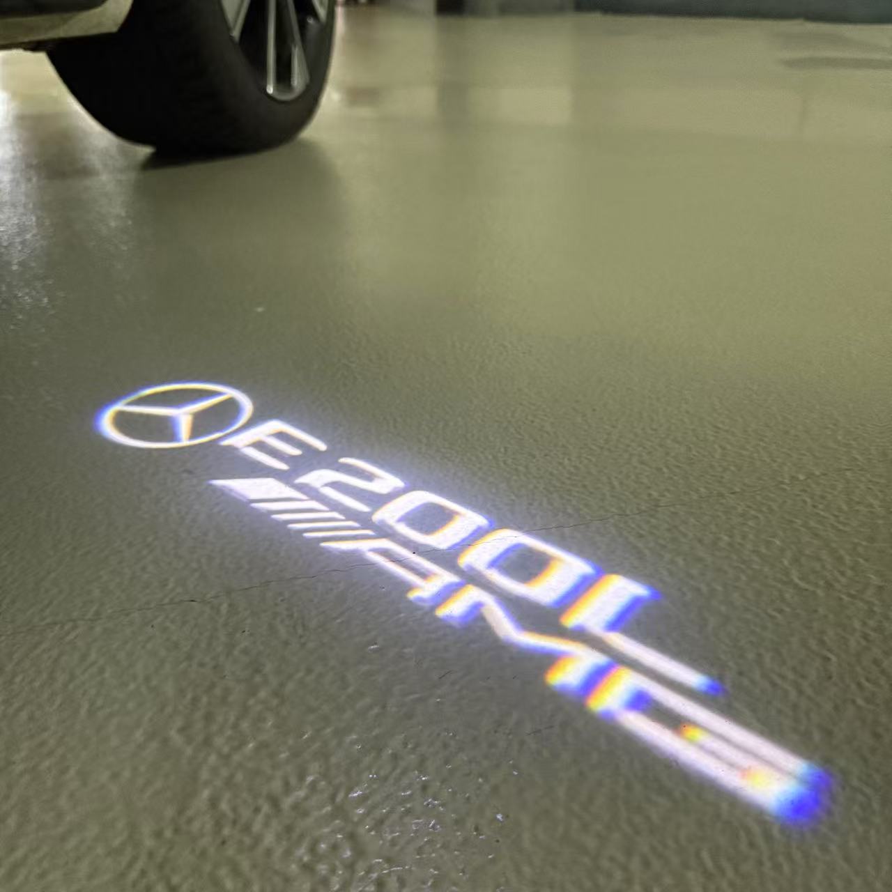 MERCEDES BENZ E 200L AMG LOGO PROJECTOT LIGHTS (quantity 1 = 1 sets/2 door lights)Nr.03f014