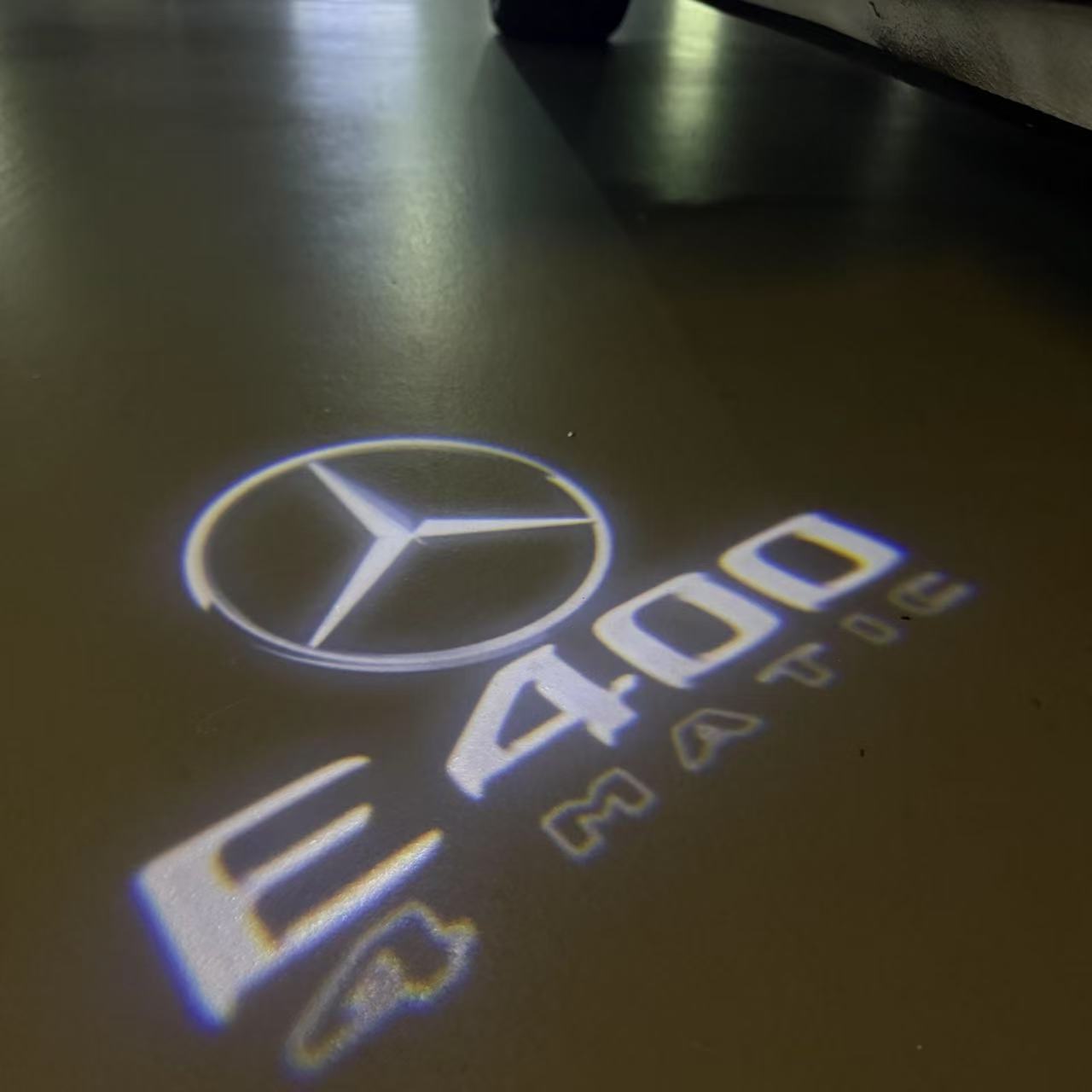 MERCEDES BENZ E 400 LOGO PROJECTOT LIGHTS (quantity 1 = 1 sets/2 door lights)Nr.03f045