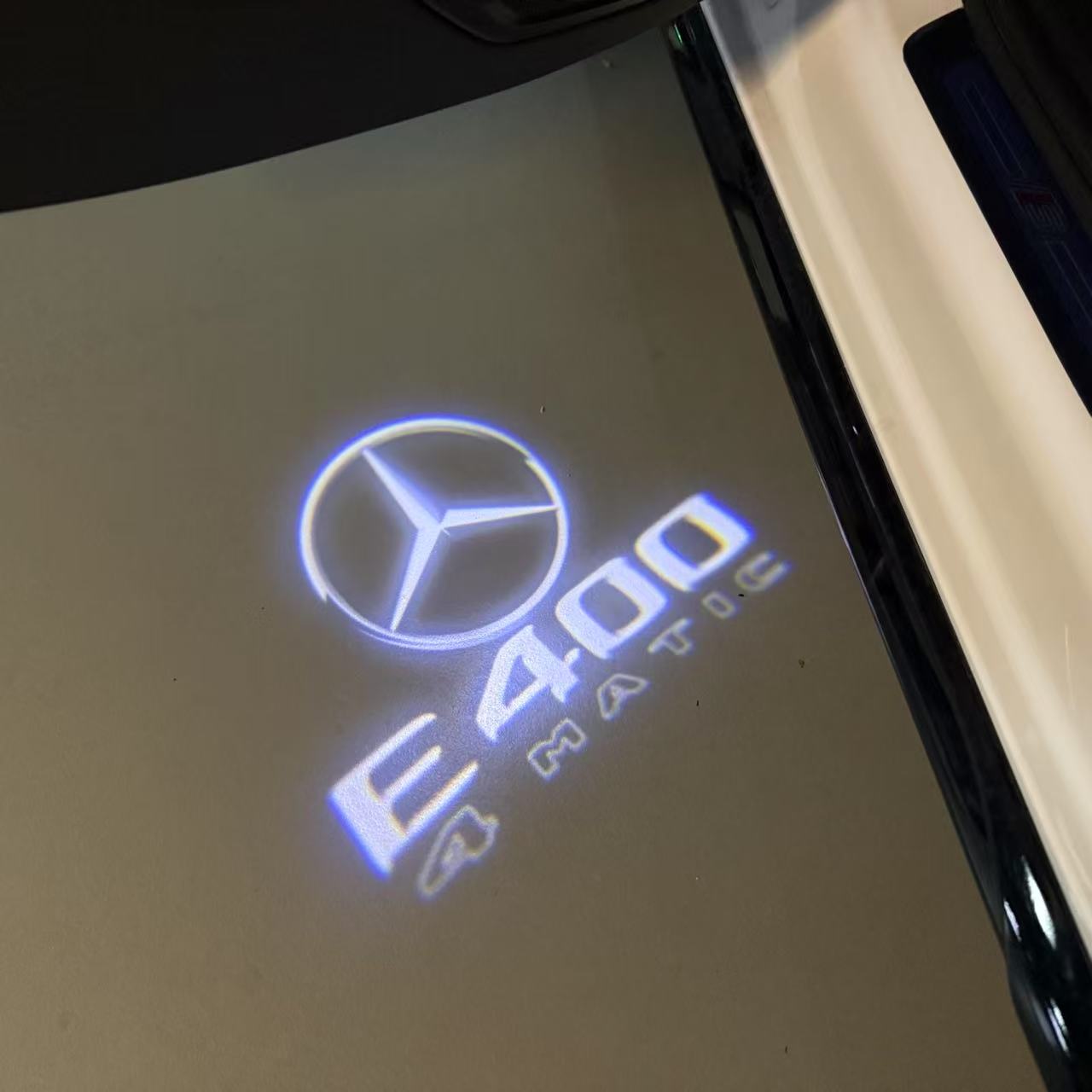 MERCEDES BENZ E 400 LOGO PROJECTOT LIGHTS (quantity 1 = 1 sets/2 door lights)Nr.03f045