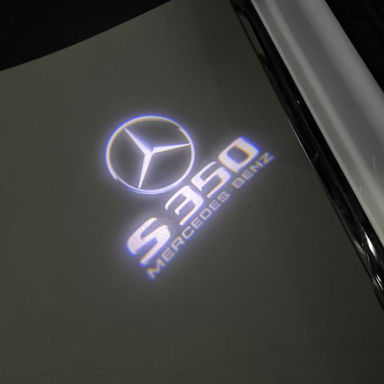 MERCEDES BENZ S 350 LOGO PROJECTOR LIGHTS (quantity 1 = 1 sets/2 door lights)Nr.03f027