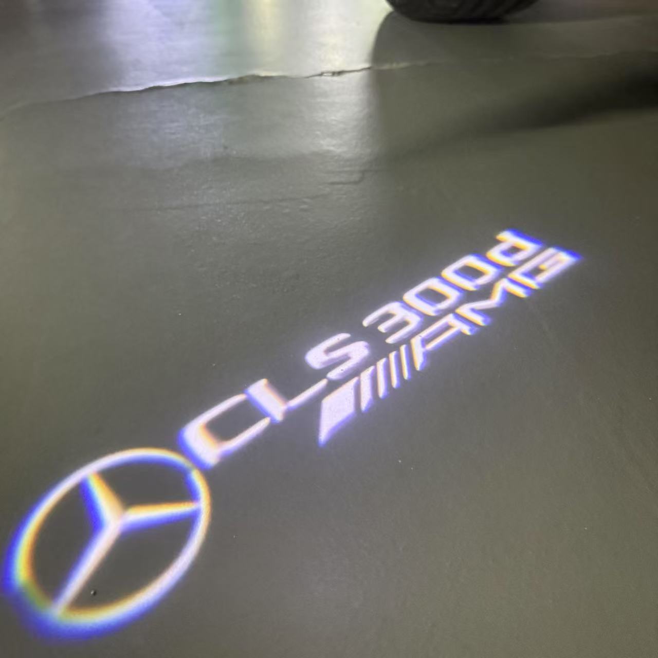 MERCEDES BENZ CLS 300d AMG LOGO PROJECTOT LIGHTS (quantity 1 = 1 sets/2 door lights)Nr.03f026