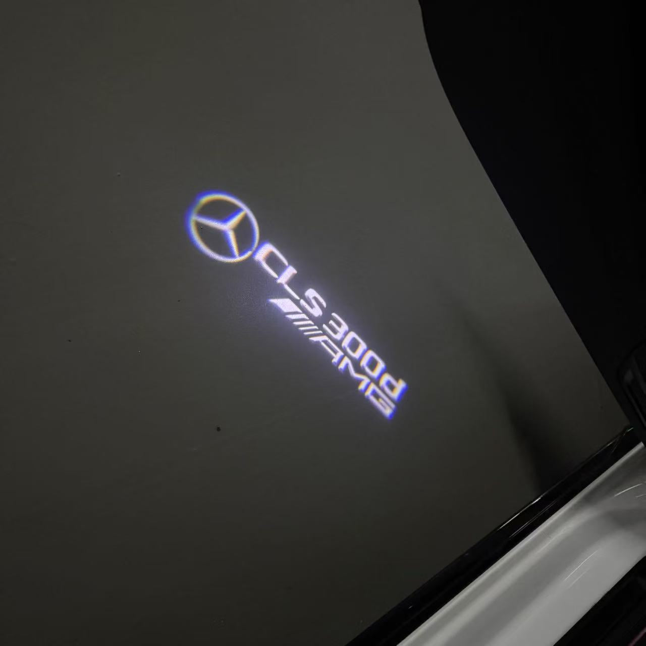 MERCEDES BENZ CLS 300d AMG LOGO PROJECTOT LIGHTS (quantity 1 = 1 sets/2 door lights)Nr.03f026