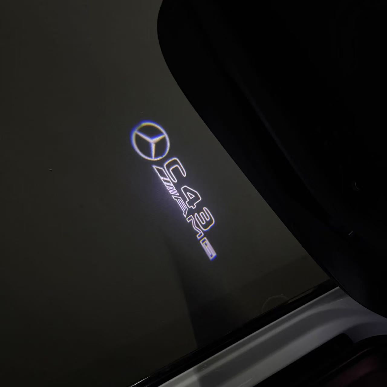 MERCEDES BENZ C43 AMG LOGO PROJECTOT LIGHTS (quantity 1 = 1 sets/2 door lights)Nr.03f04