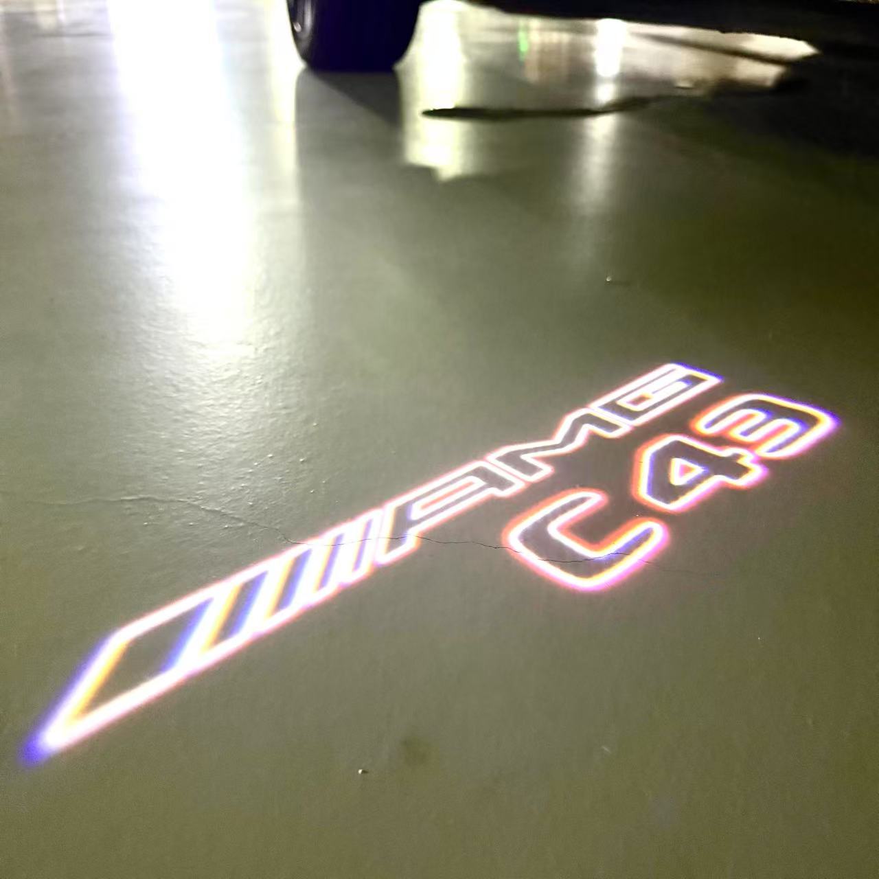 MERCEDES BENZ C43 AMG LOGO PROJECTOT LIGHTS (quantity 1 = 1 sets/2 door lights)Nr.03f07