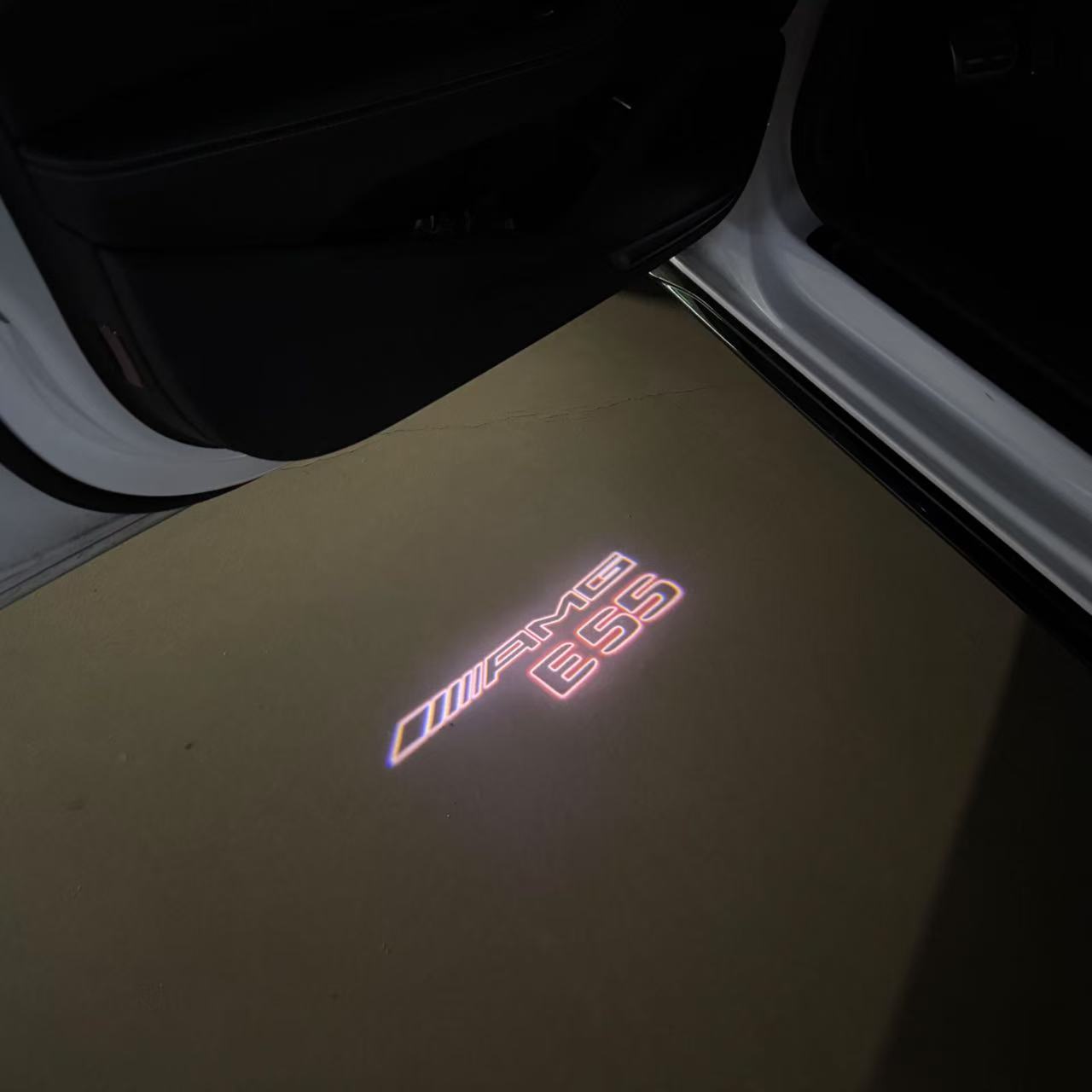 MERCEDES BENZ E55 AMG LOGO PROJECTOT LIGHTS (quantity 1 = 1 sets/2 door lights)Nr.03f06
