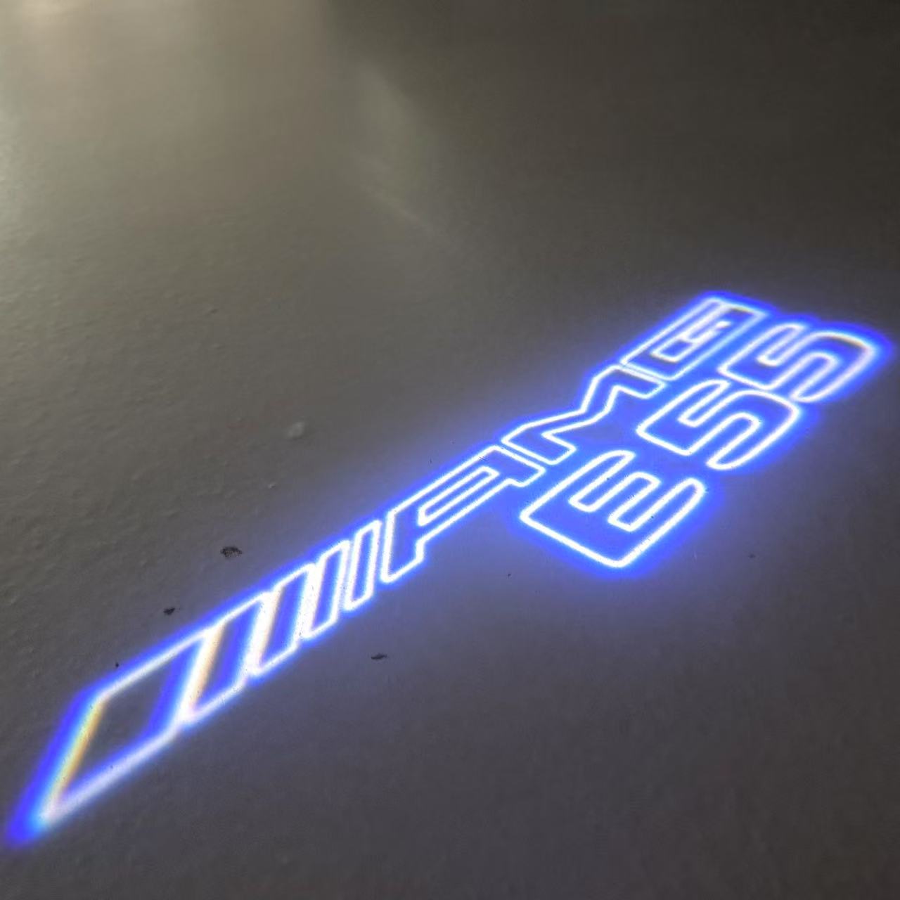 MERCEDES BENZ E55 AMG LOGO PROJECTOT LIGHTS (quantity 1 = 1 sets/2 door lights)Nr.03f07
