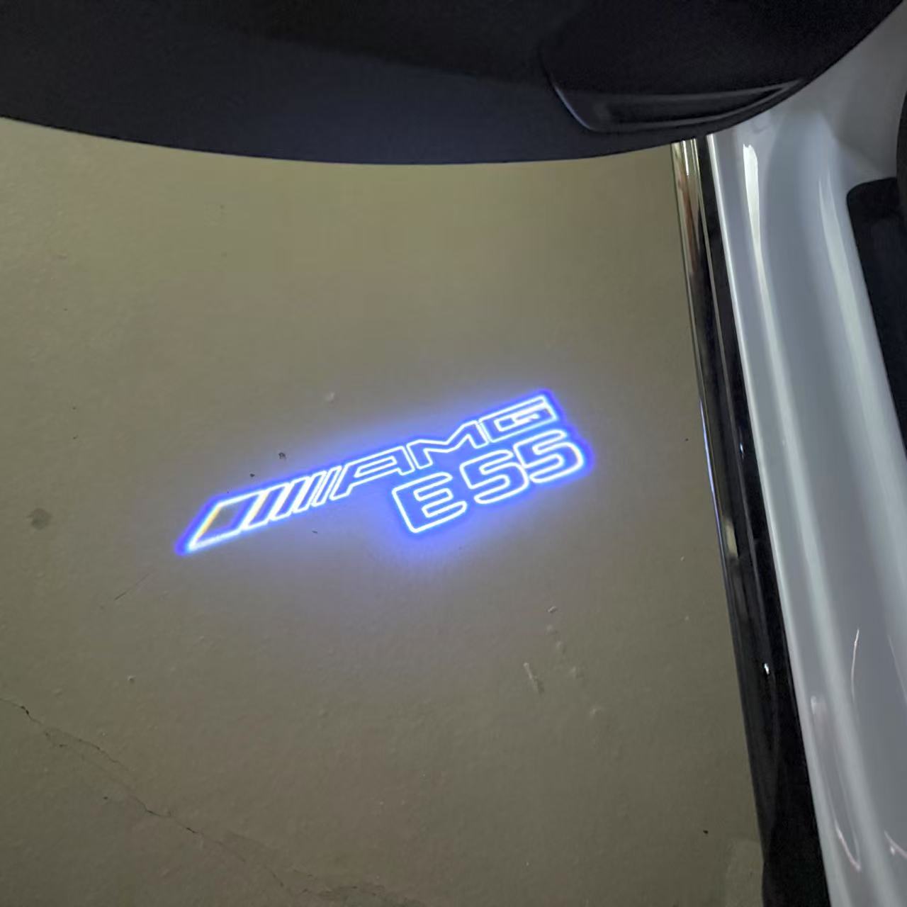 MERCEDES BENZ E55 AMG LOGO PROJECTOT LIGHTS (quantity 1 = 1 sets/2 door lights)Nr.03f07