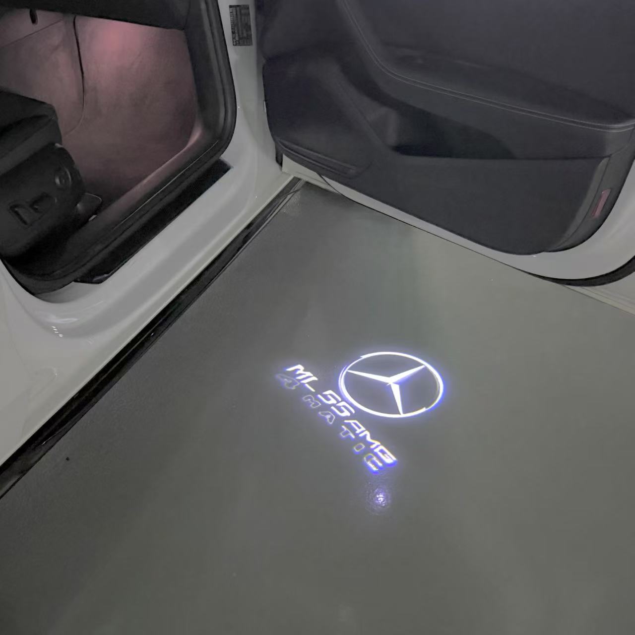 MERCEDES BENZ ML 55 AMG LOGO PROJECTOR LIGHTS (quantity 1 = 1 sets/2 door lights)Nr.03f05