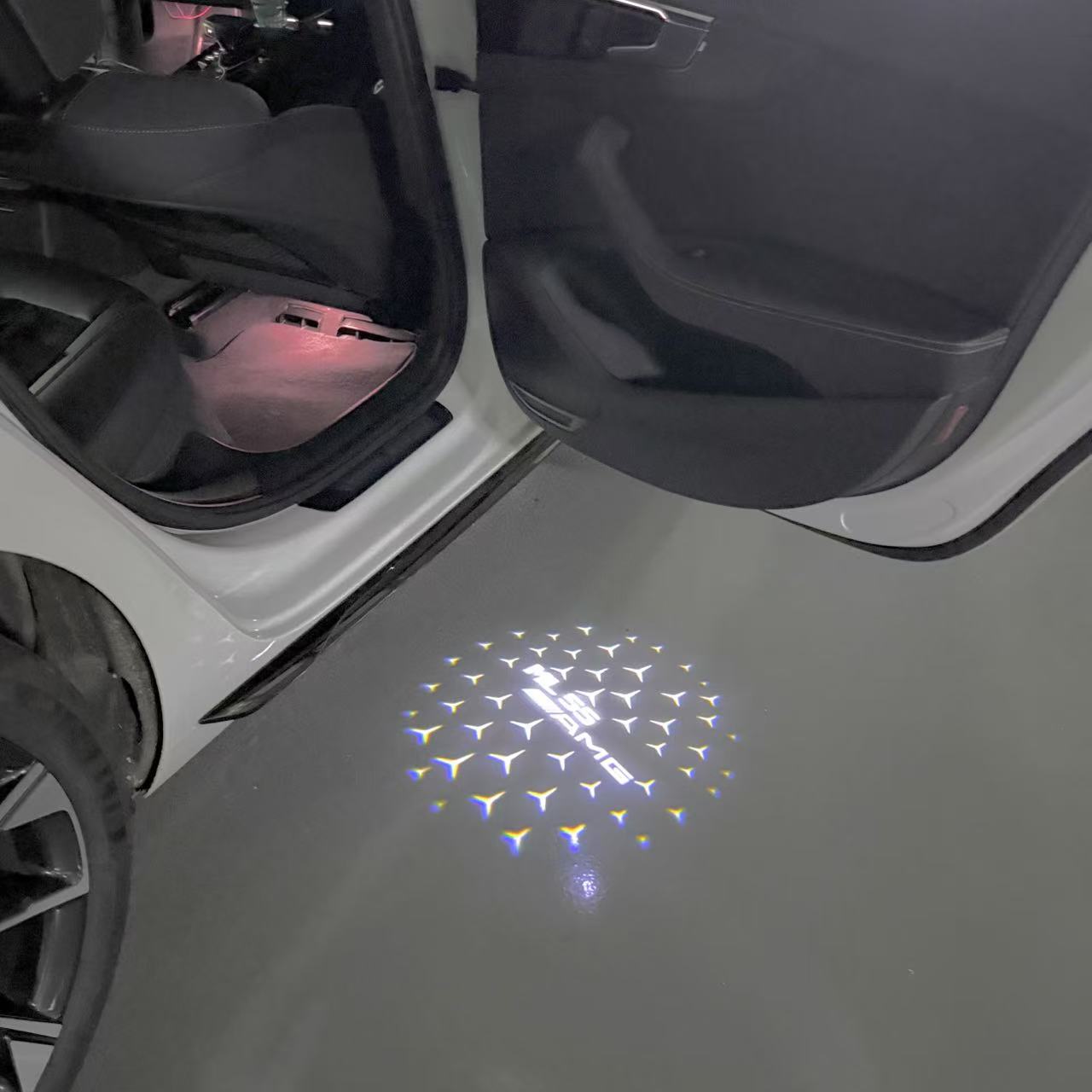 MERCEDES BENZ ML 55 AMG LOGO PROJECTOR LIGHTS (quantity 1 = 1 sets/2 door lights)Nr.03f06