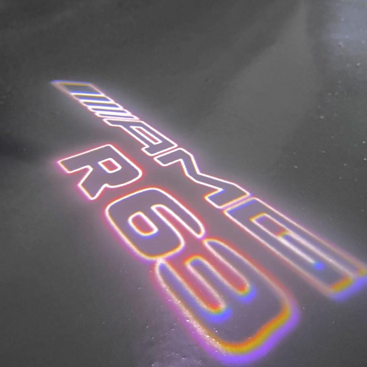 MERCEDES BENZ R 63 AMG LOGO PROJECTOR LIGHTS (quantity 1 = 1 sets/2 door lights)Nr.03f024