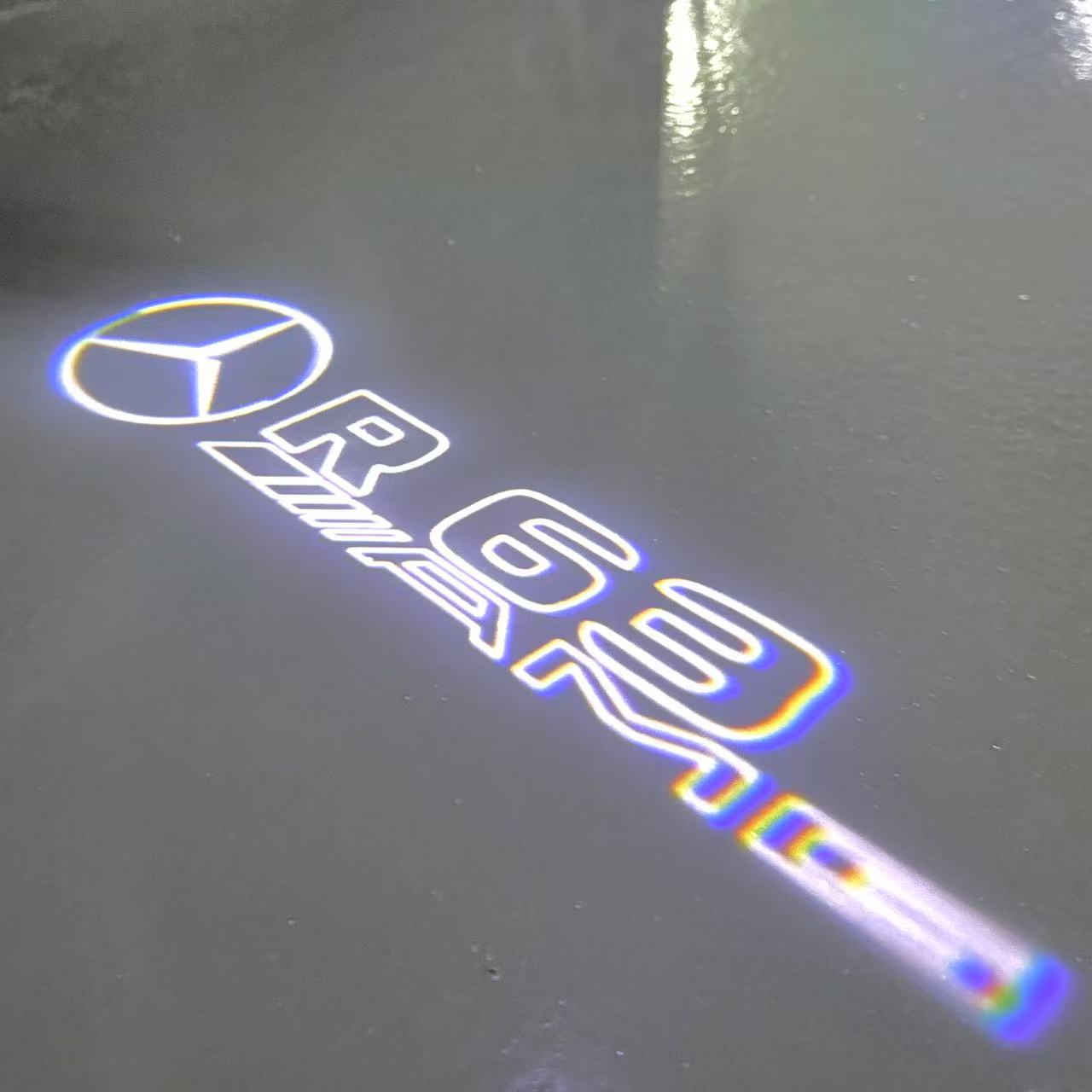 MERCEDES BENZ R 63 AMG LOGO PROJECTOR LIGHTS (quantity 1 = 1 sets/2 door lights)Nr.03f025