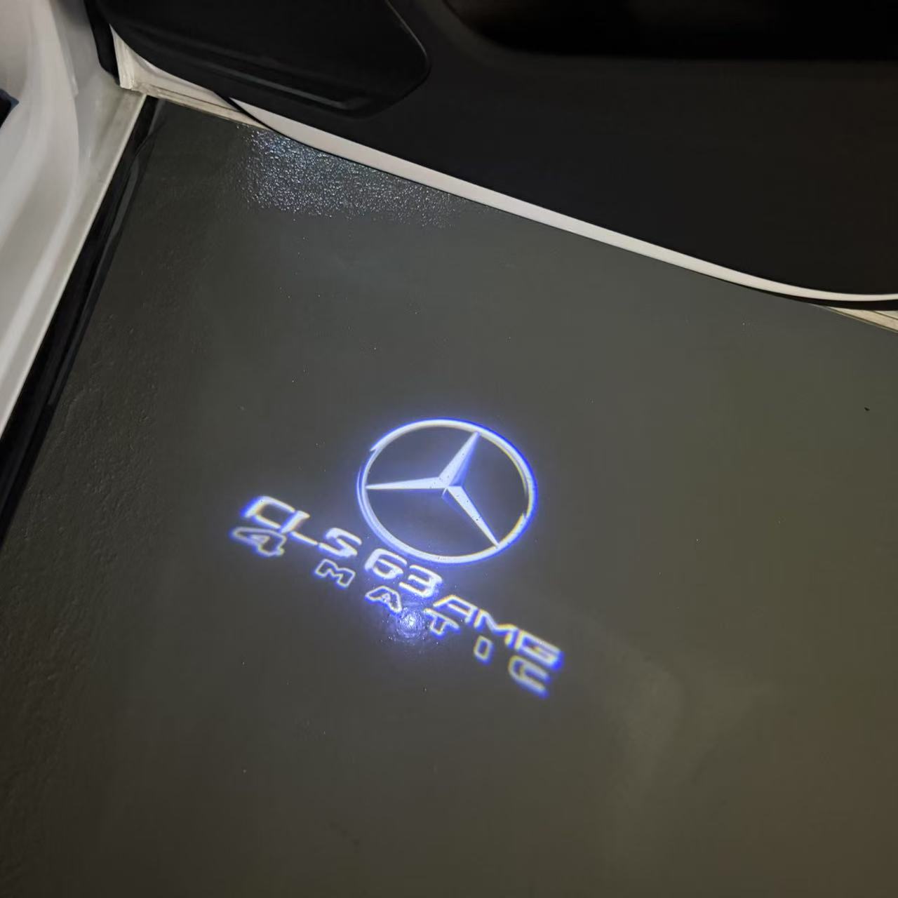 MERCEDES BENZ CLS 63 AMG LOGO PROJECTOT LIGHTS (quantity 1 = 1 sets/2 door lights)Nr.03f014