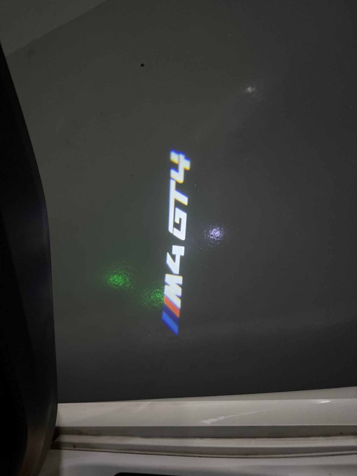 BMW 4 SERIES M4 LOGO PROJECTOT LIGHTS (quantity 1 = 1 sets/2 door lights) Nr.6024q57