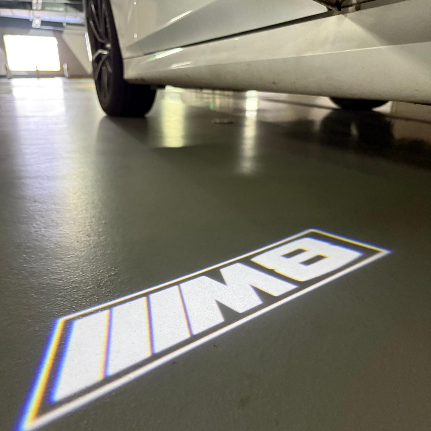 BMW 8 SERIES M8 LOGO PROJECTOT LIGHTS (quantity 1 = 1 sets/2 door lights) Nr.6024q107