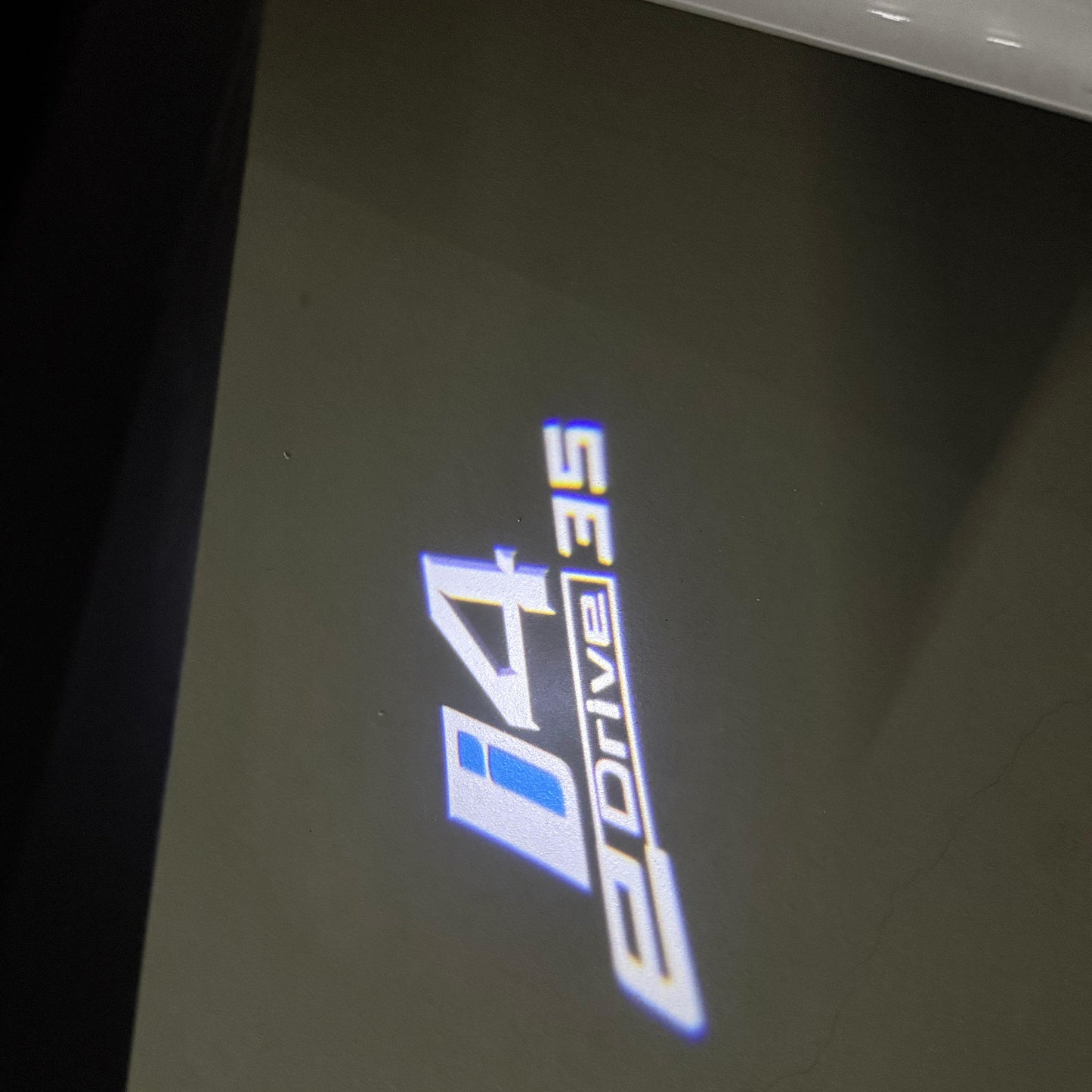 BMW i4 E Drive LOGO PROJECTOT LIGHTS (quantity 1 = 1 sets/2 door lights) Nr.6024q115