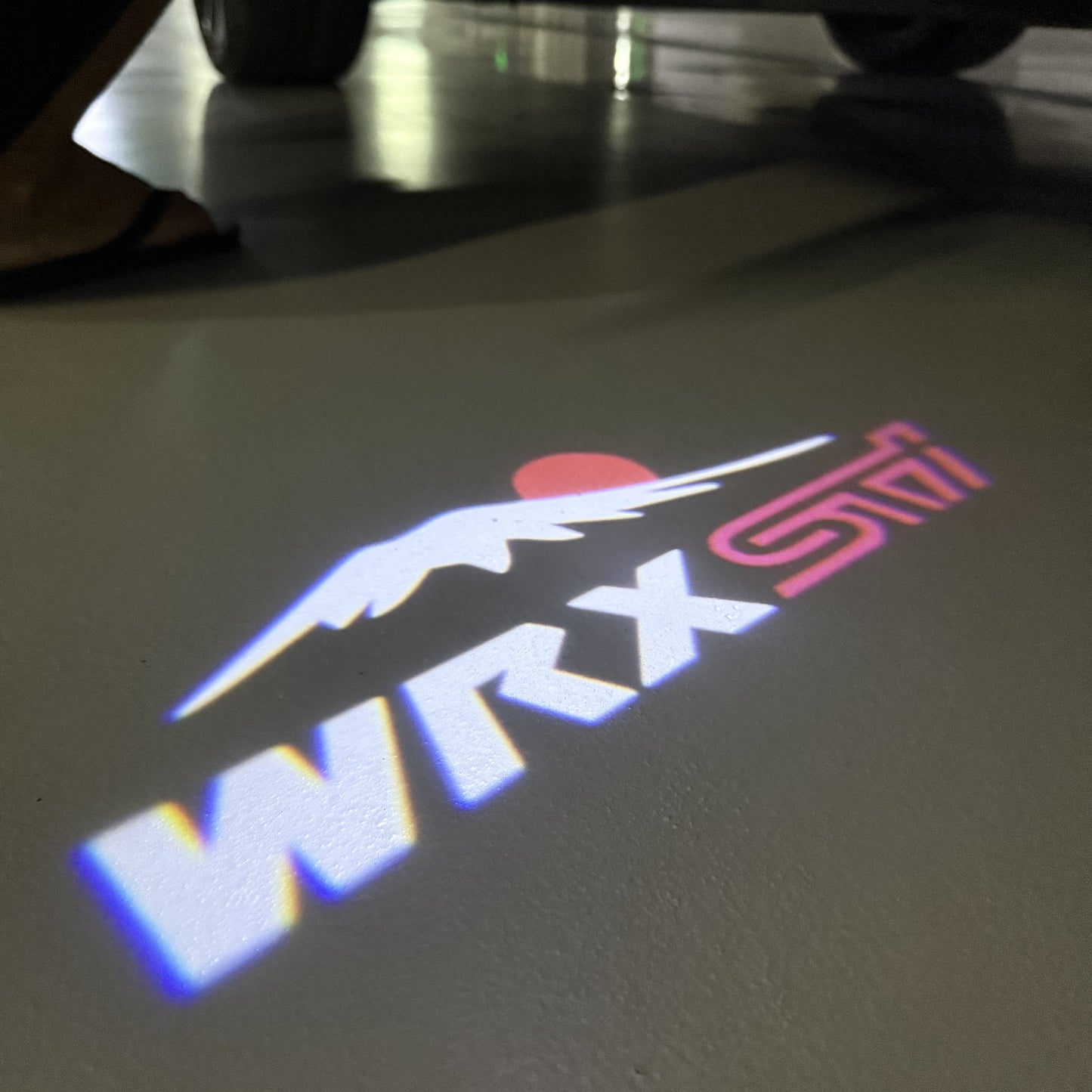 SUBARU WRX STI LOGO PROJECROTR LIGHTS (quantity 1 = 1 sets/2 door lights) Nr.03A20