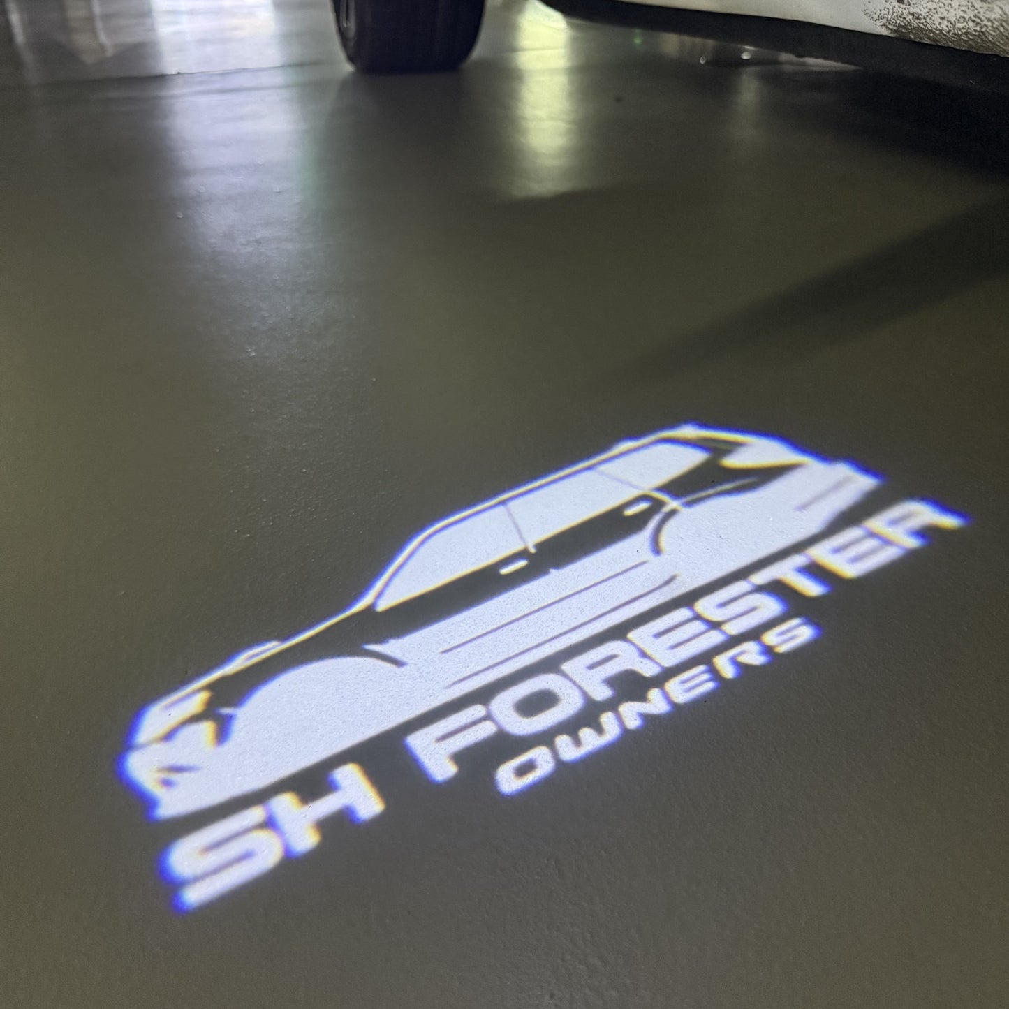 SUBARU FORESTER LOGO PROJECROTR LIGHTS (quantity 1 = 1 sets/2 door lights) Nr.03A32