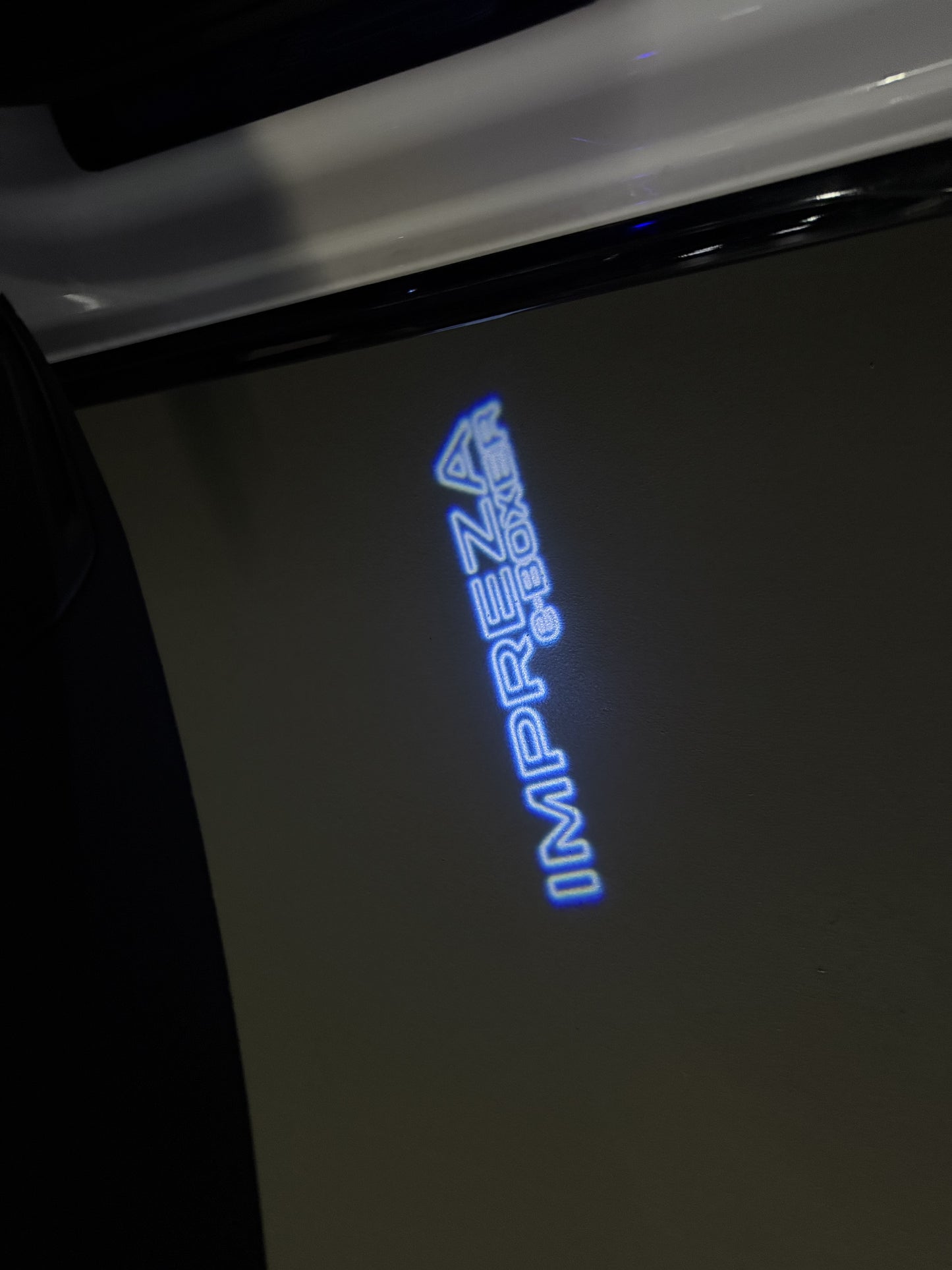 SUBARU IMPREZA LOGO PROJECROTR LIGHTS (quantity 1 = 1 sets/2 door lights) Nr.03A47