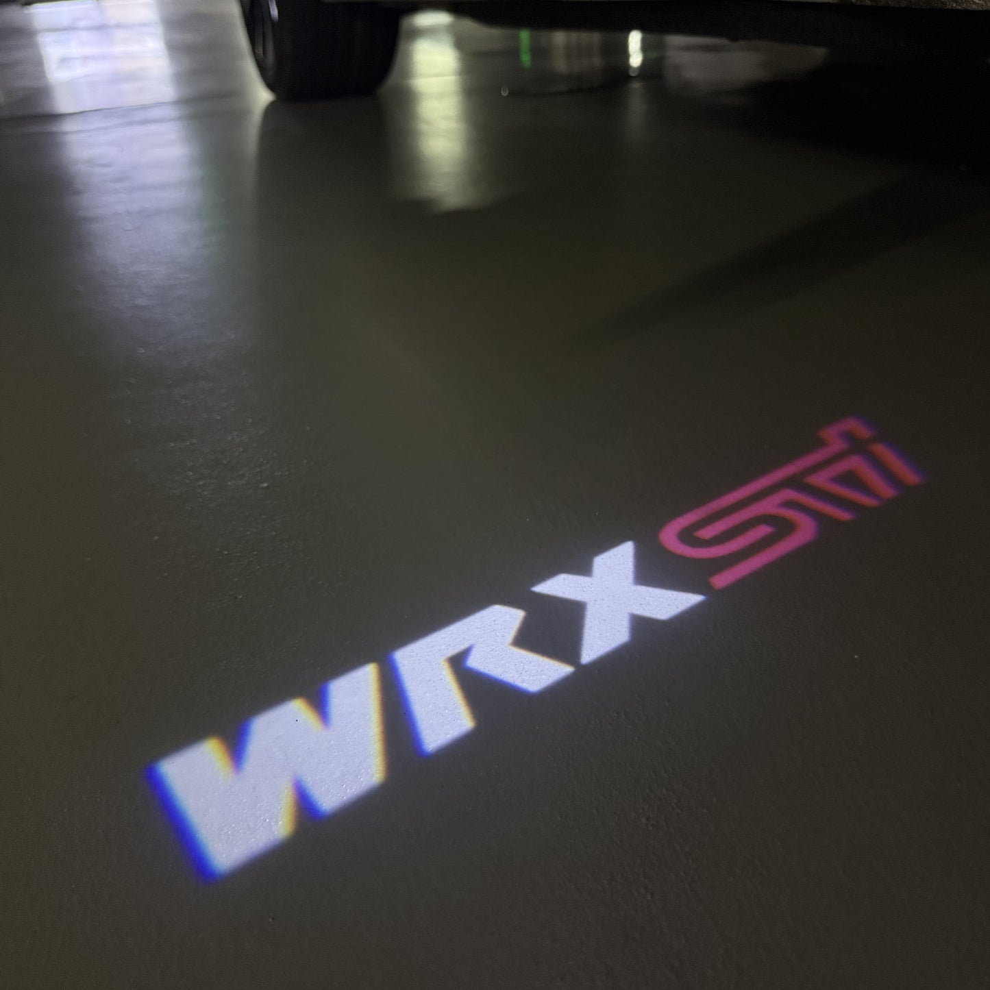 SUBARU WRX STI LOGO PROJECROTR LIGHTS (quantity 1 = 1 sets/2 door lights) Nr.03A21