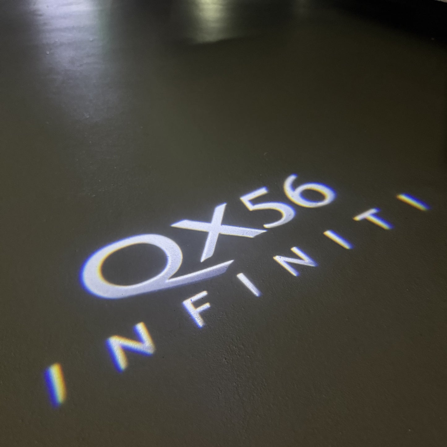 INFINITI QX56 LOGO PROJECROTR LIGHTS (quantity 1 = 1 sets/2 door lights)Nr.74A8