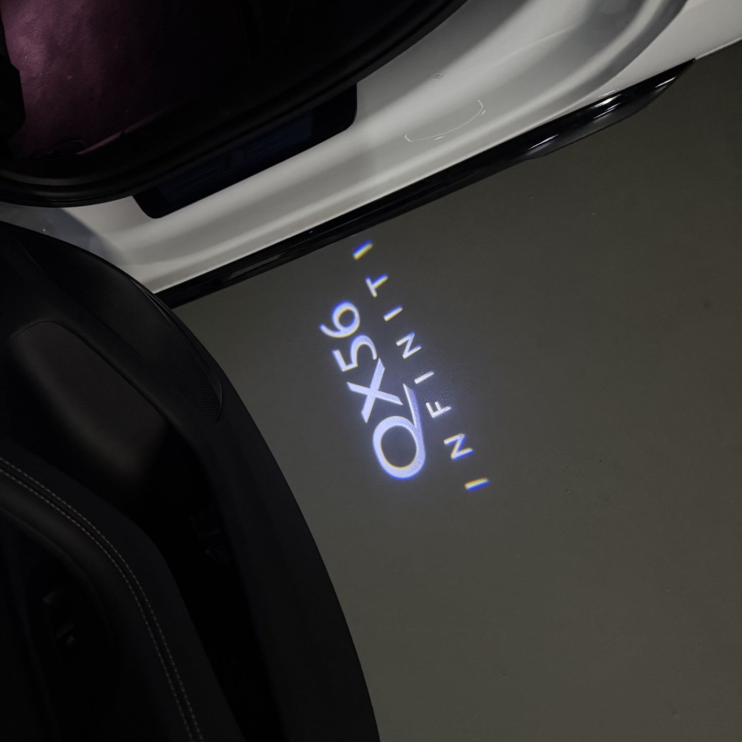 INFINITI QX56 LOGO PROJECROTR LIGHTS (quantity 1 = 1 sets/2 door lights)Nr.74A8